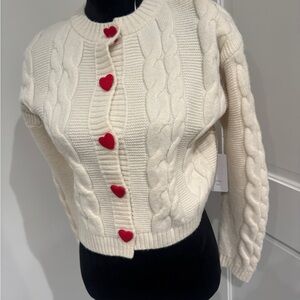 Elegant Cream Cardigan with Red Heart Details